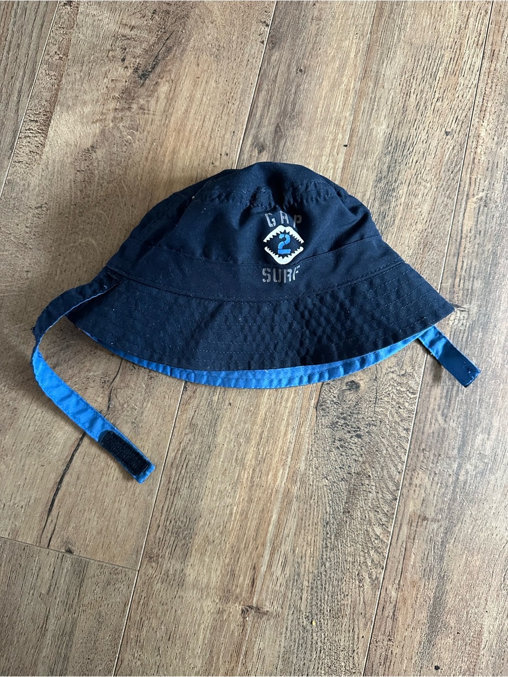 GAP Navy and Bright Blue Infant Bucket Hat with Chin Strap